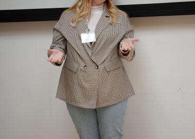 Photo of Alannah Somers singing at the National Student Engagement Network event May 2023.