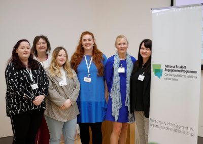 This is a photo of the NStEP staff and staff and student members of the South East Technological University smiling while attending the National Student Engagement Event in May 2023.